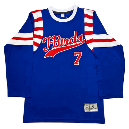 1975 Los Angeles Thunderbirds 1970's Jersey blue. Alternating red and white bands at shoulders. White, red, and white bands mid-sleeve. T-Birds stylized in red with white trim across chest. #7 in red with white trim below right.  Royal Retros