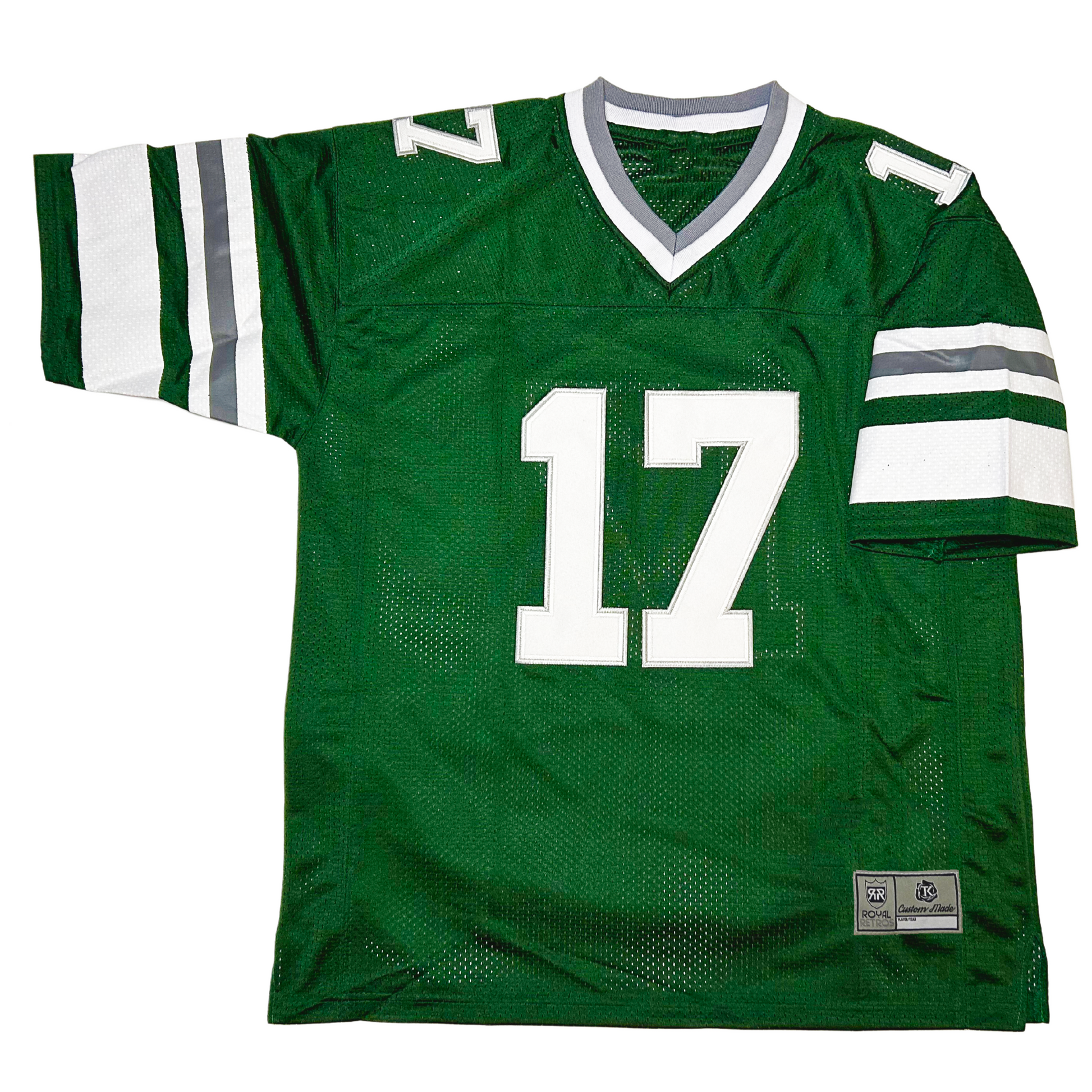 1980s Philadelphia Eagles Jaws Jersey. Green. Silver and white collar. White, silver, white band mid-sleeve. Large white band just above sleeve end. #17 white with silver trim large on chest, small on shoulders. Royal Retros.