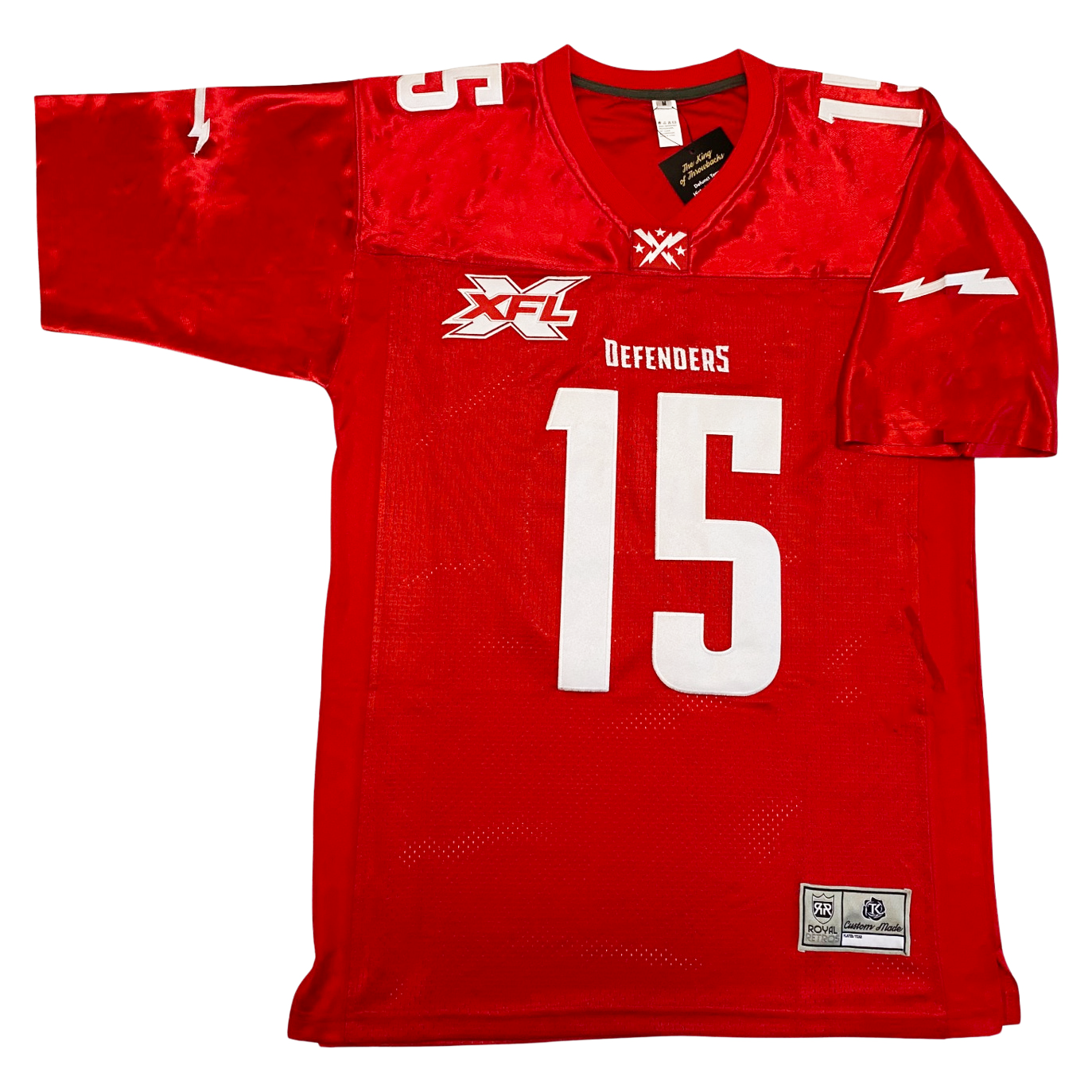 2020 DC Defenders XFL jersey red. Red and white XFL logo over right chest, Defenders in white above large #15 in white. Small #15 in white on shoulders, white lightning bolts on sleeves. Royal Retros