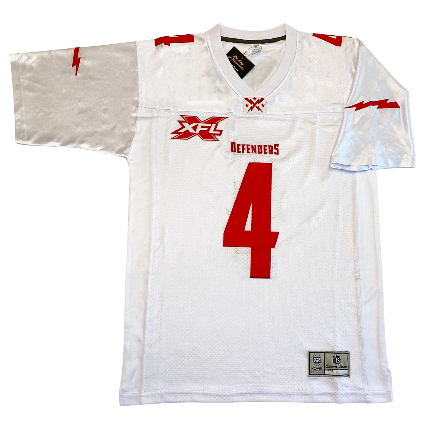 2020 DC Defenders XFL jersey white. Red and white XFL logo over right chest, Defenders in red above large #4 in red. Small #4 in red on shoulders, red lightning bolts on sleeves. Royal Retros