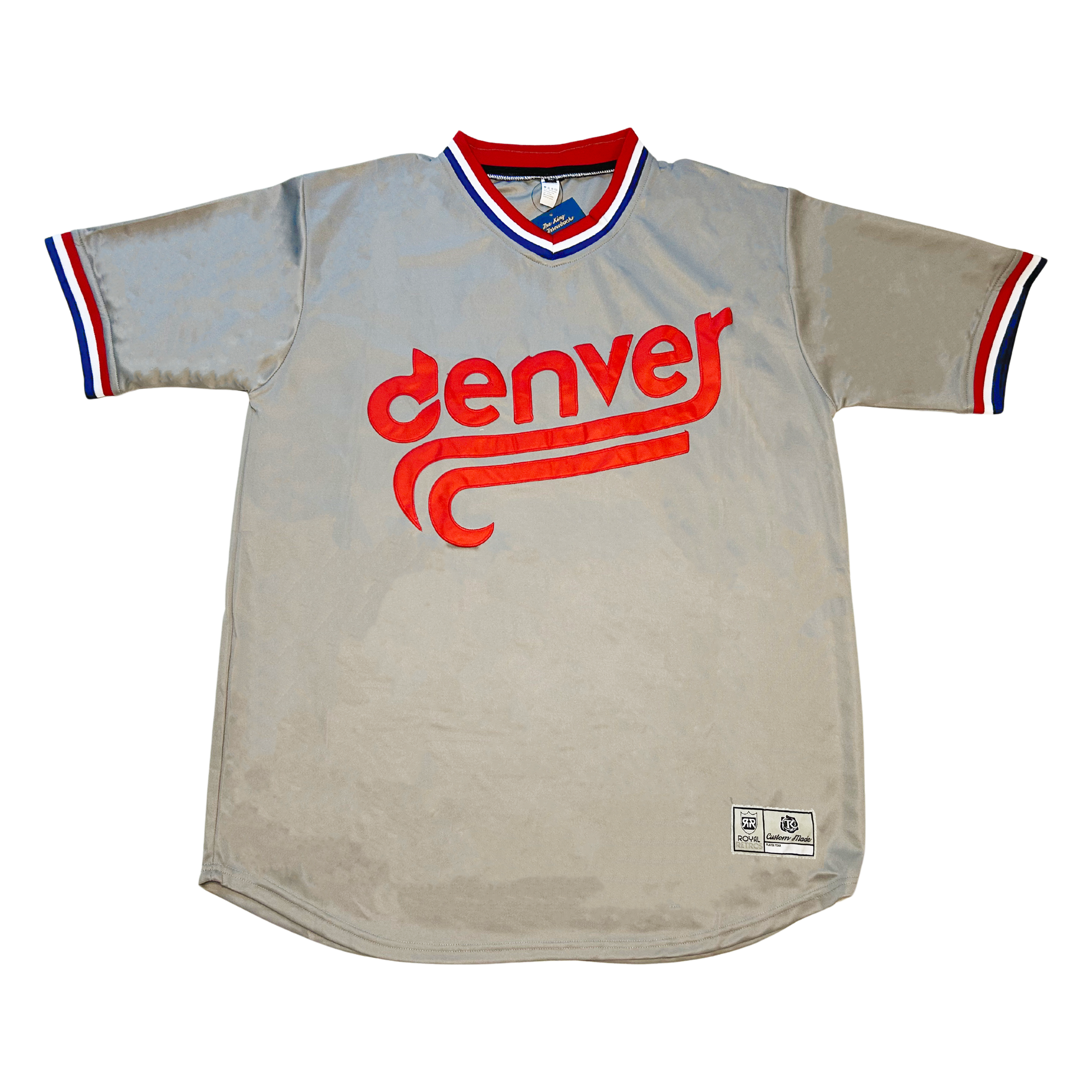 Denver Bears gray baseball jersey. Red, white, and blue collar and sleeve ends. Stylized denver in lower case in red  with sweeping double tail underneath.