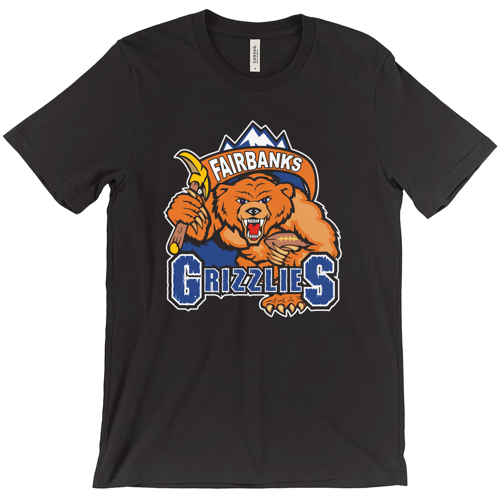 Fairbanks Grizzlies T-shirt. Black. Mountain peaks with brown banner with Fairbanks in white inside. Below, a growling bear, face on, holding a pick in his right arm and a football in his left over GRIZZLIES on blue with white trim. Royal Retros