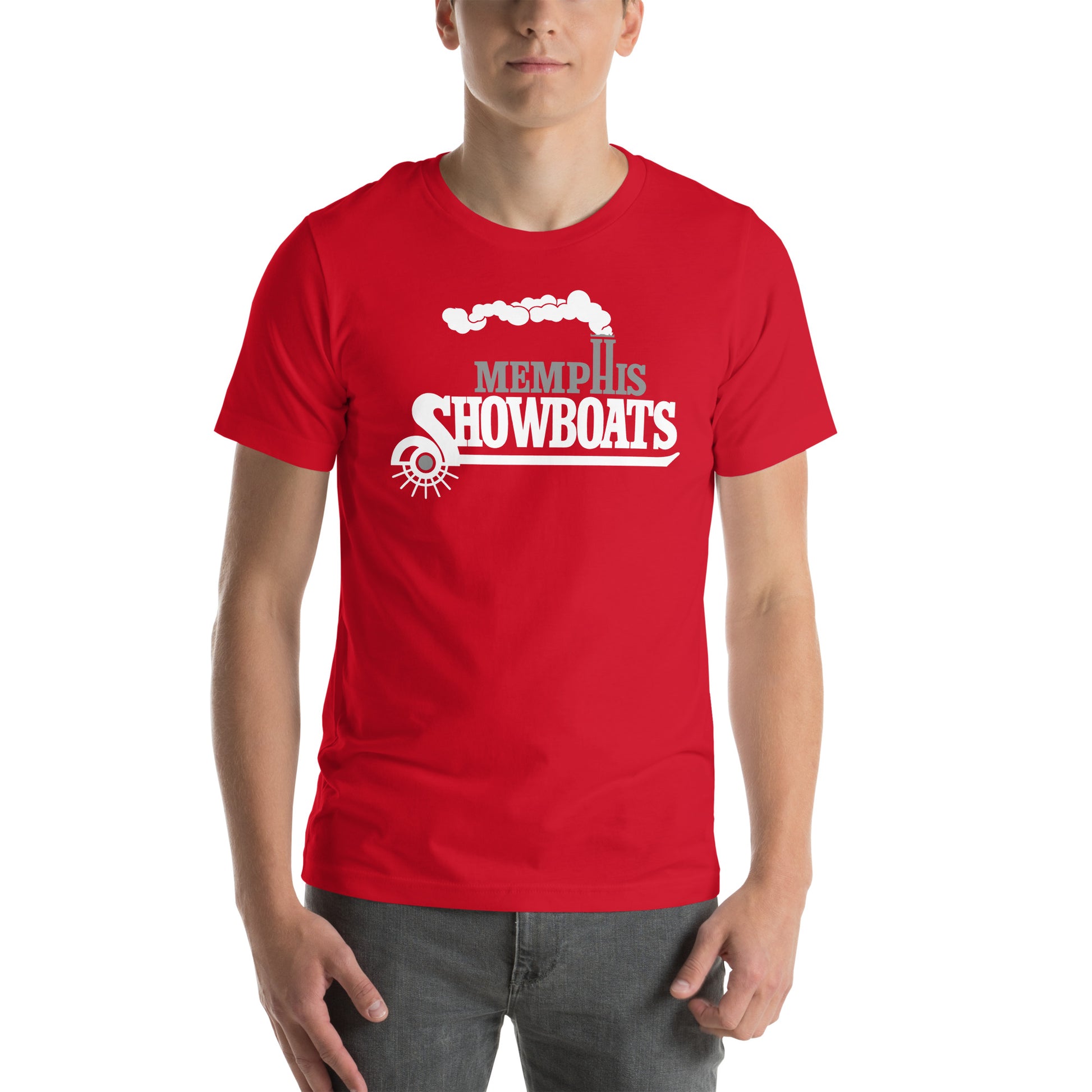 Memphis Showboats 1980s T-shirt. Red. MEMPHIS in gray with H forming smokestacks with white steam trailing away to the left. SHOWBOATS below in white with paddle wheel forming bottom of "S" and red underline. Royal Retros 