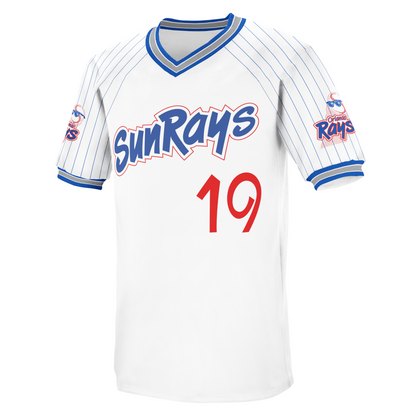 Orlando Sun Rays white pullover baseball jersey, white. Blue, silver, and blue collar and sleeve ends. Pinstripes on sleeves. Sun Rays stylized in blue with red trim. #19 in red lower right. Royal Retros