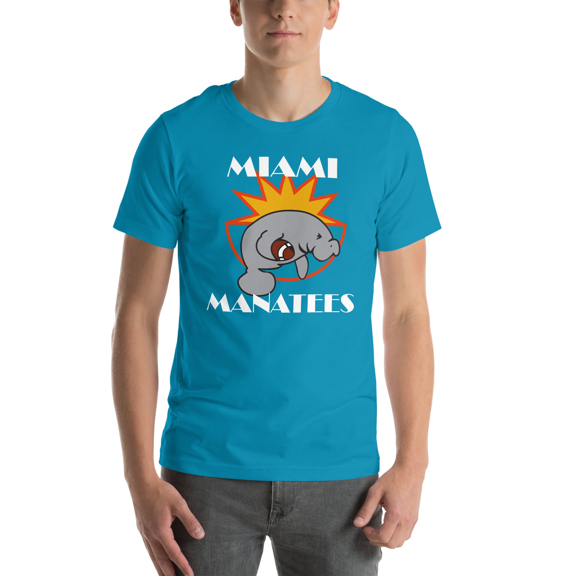 Miami Manatees T-Shirt aqua. Manatee holding football leaping in front of half sun with orange trim and aqua bowl. Miami in Broadway Script white above Manatees in Brush Script white below. Royal Retros.