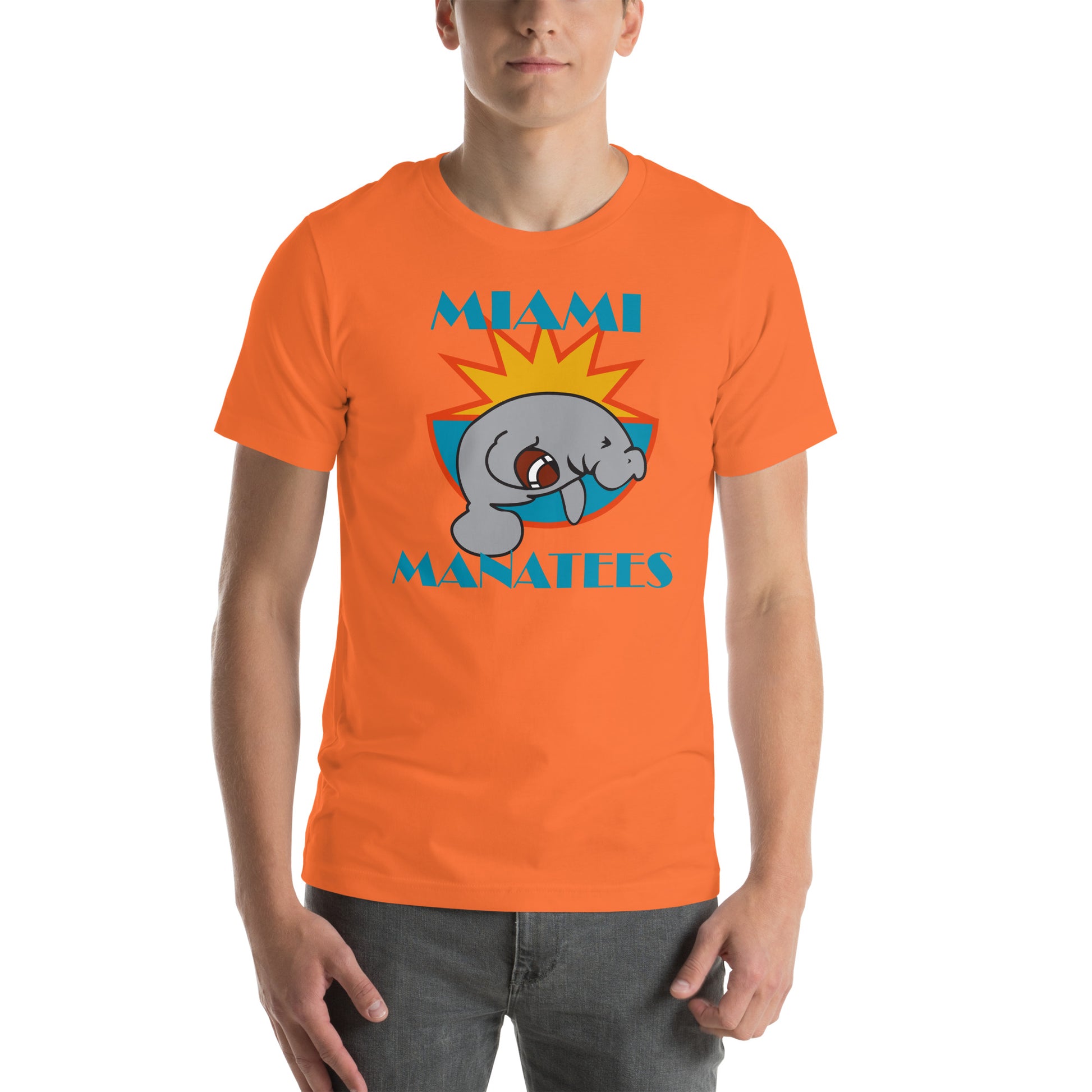 Miami Manatees T-Shirt aqua. Manatee holding football leaping on front of half sun with orange trim and aqua bowl. Miami in Broadway Script aqua above Manatees in Brush Script aqua below. Royal Retros.