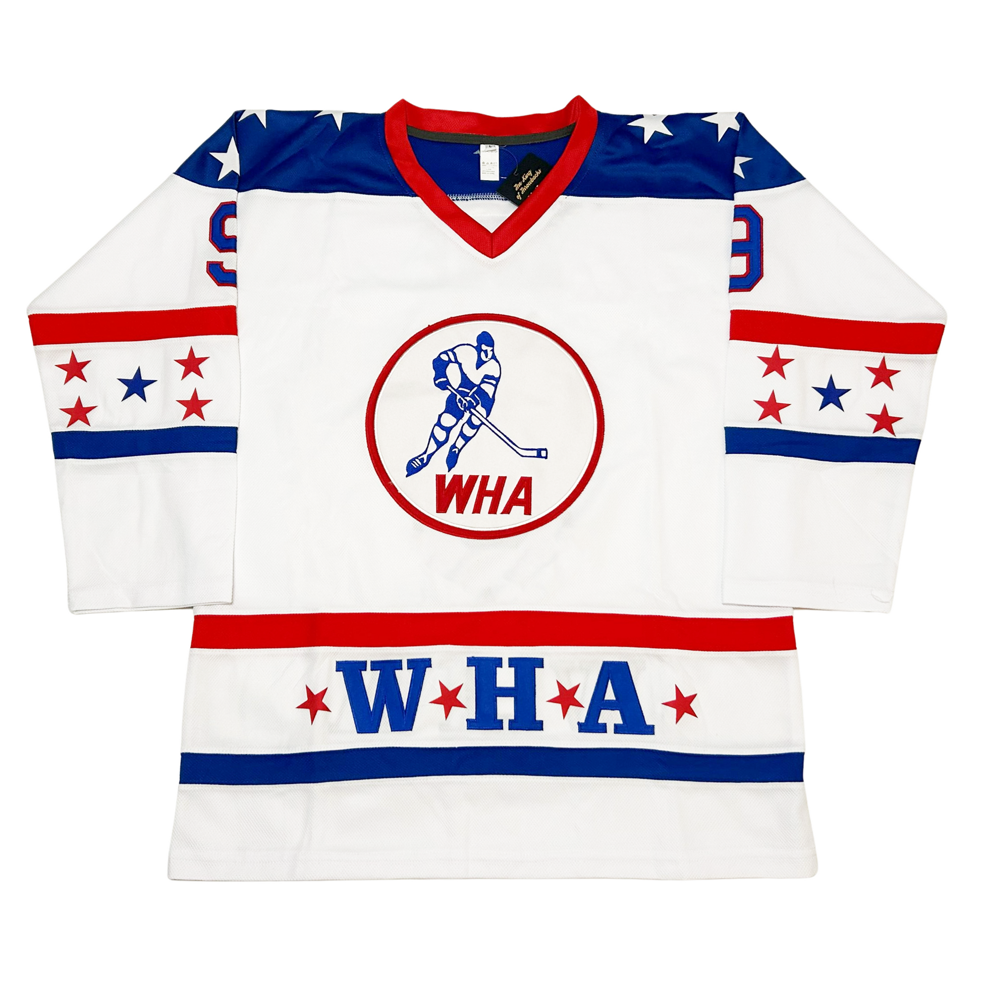 WHA All-Star Jersey. White. Red collar. Blue shoulder with white stars. Red band mid-sleeve, 4 red stars and one blue star, blue band below. Red band around waist. WHA in white with red stars before, after and between letters. White banc below. WHA logo. Red circle, white background, blue skater, WHA in blue at bottom of circle. Royal Retros