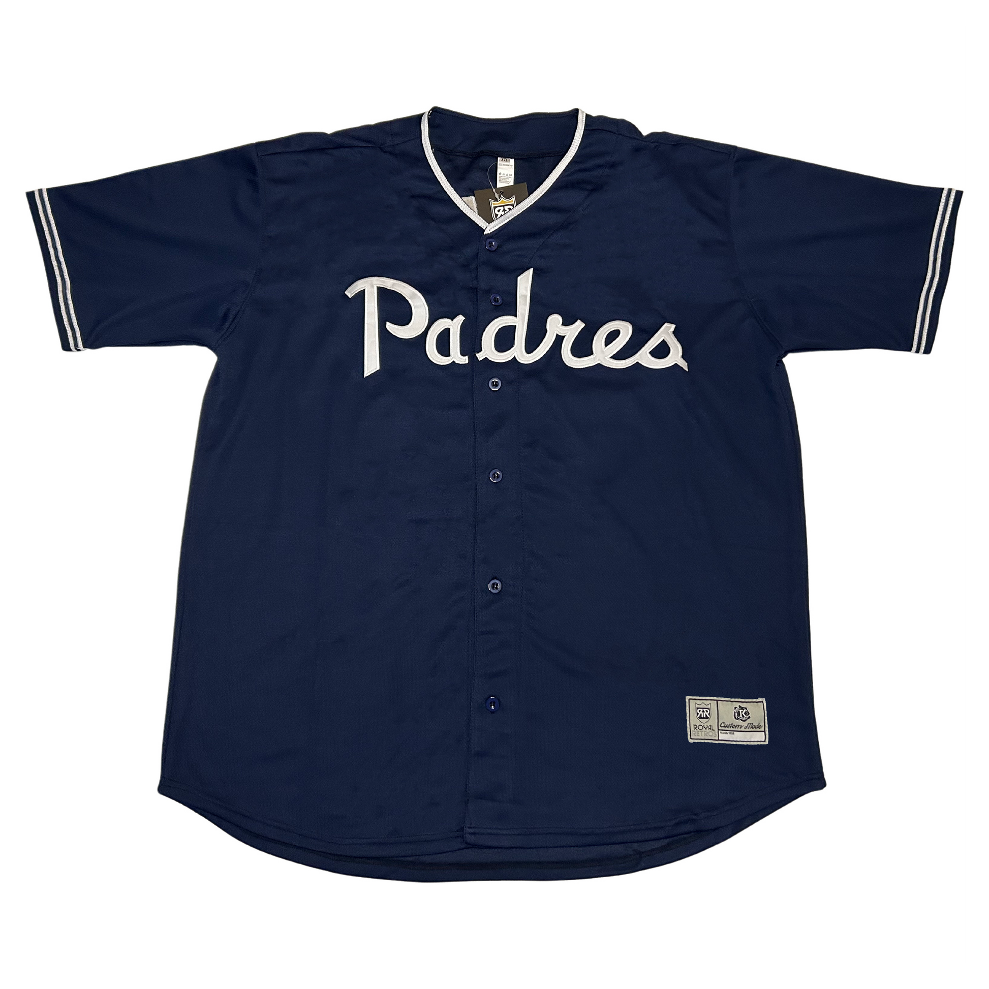 PCL Padres Home button-up Jersey 1952. Navu blue. "Padres" in cursive across chest. White collar. Two thin white bands at sleeve ends. Royal Retros