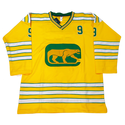 Chicago Cougars Jersey yellow. Three whire green, white, and green bands on sleeves and waist and shoulders. #9 in green with white trim on upper left chest.  Logo: Profile of gold cougar on green background. Royal Retros