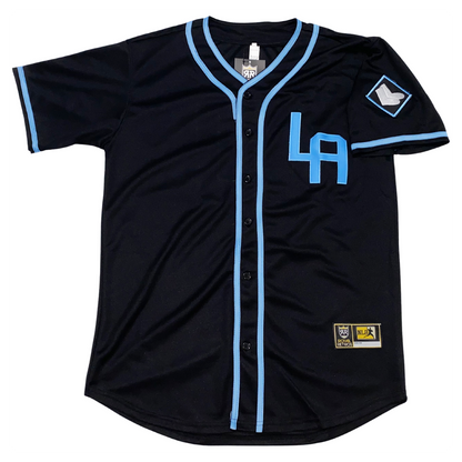 Los Angeles White Sox negro league button-up jersey Black. Light blue trim on sleeve ends around neck and down front on either side of buttons. Interlocking LA in light blue on upper chest. White socks in diamond with white trim on left sleeve. Royal Retros   