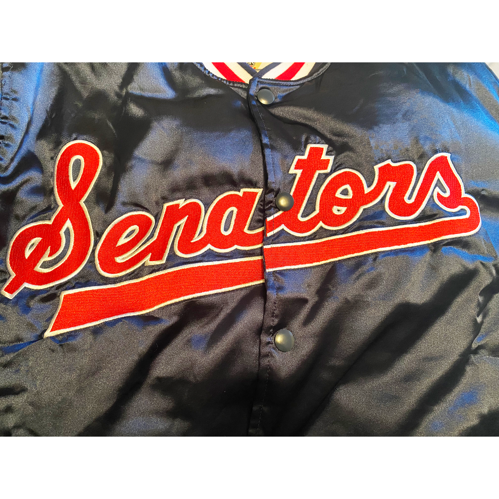 Senators Jacket close-up Senators in red script with white trim Royal Retros